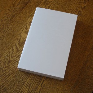 Blank_book_on_a_table
