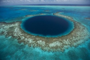 The Blue Hole at Lighthouse Reef in the middle of the 160-mile MesoAmerican Barrier Reef, the second largest barrier reef in the world. The Blue Hole is 400-feet deep and more than 1,000 feet across. It is a sunken cave that was flooded during the last ice age.