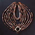 Final physical reconstruction of the necklace from the child's grave at Ba'ja, Jordan, today exposed at the new museum of Petra in Jordan. Alarashi et al., 2023, PLOS ONE, CC-BY 4.0