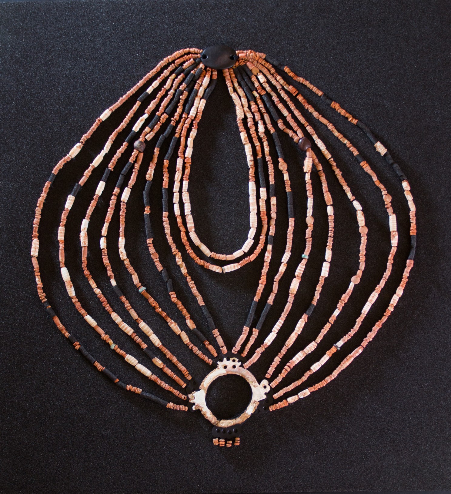 Final physical reconstruction of the necklace from the child's grave at Ba'ja, Jordan, today exposed at the new museum of Petra in Jordan. Alarashi et al., 2023, PLOS ONE, CC-BY 4.0