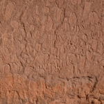 Detail of Stone Age depictions of human footprints and animal tracks in Doro !Nawas mountains, Namibia.  Andreas Pastoors, CC-BY 4.0