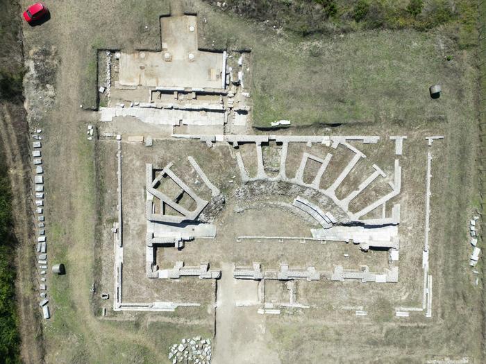 The remains of the theatre (bottom) and basilica (top), seen from above.
