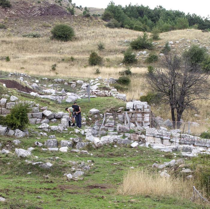 Field assistants setting up a speaker and meteorological testing devices at the southern entrance of a tunnel leading to the hippodrome. Credits: Image by Pamela Jordan