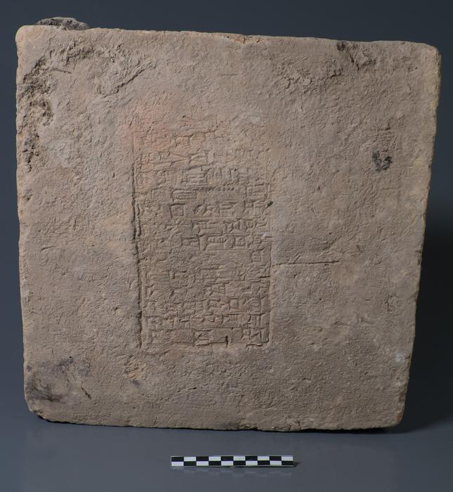 Brick dates to the reign of Nebuchadnezzar II (ca. 604 to 562 BCE) based on the interpretation of the inscription. This object was looted from its original context before being acquired by the Slemani Museum and stored in that museum with agreement from the central government. Image courtesy of the Slemani Museum. Credits: Slemani Museum