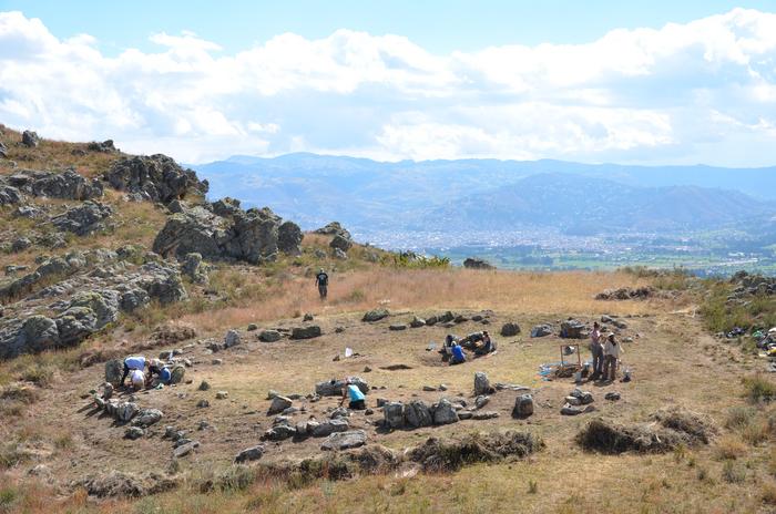 A team including University of Wyoming anthropologists works at the site of a circular stone plaza that was built around 4,750 years ago in the Cajamarca Basin of northern Peru. Credits: Jason Toohey