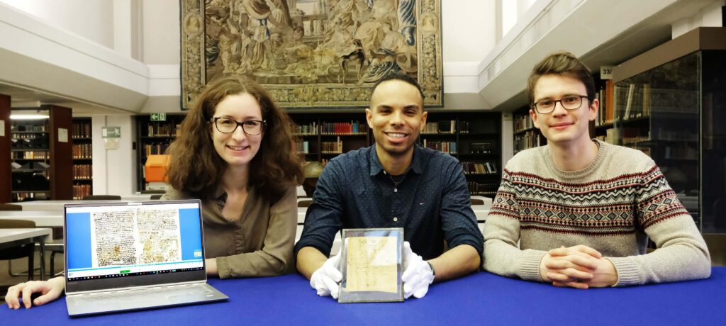 Papyri Copticae Magicae team JMU The project team at the start of work at the end of 2018 in the University Library's manuscript collection with (from left) Markéta Preininger, Korshi Dosoo and Edward O. D. Love. (Photo Credits: Gunnar Bartsch / Universität Würzburg)