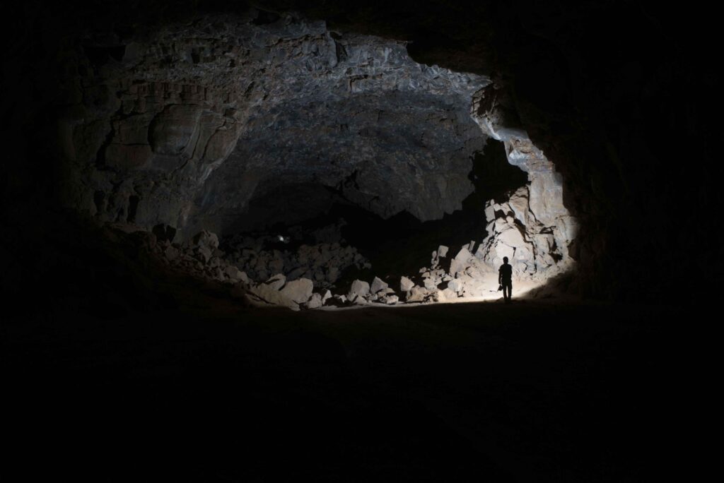 Researchers exploring the Umm Jirsan Lava Tube system. Credits: PALAEODESERTS Project, CC-BY 4.0