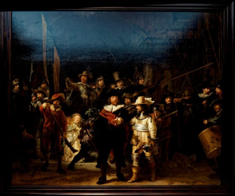 Militia Company of District II under the Command of Captain Frans Banninck Cocq, or The Shooting Company of Frans Banning Cocq and Willem van Ruytenburch, usually referred to as The Night Watch (De Nachtwacht in Dutch), by Rembrandt van Rijn (1642), in the collections of the Amsterdam Museum, typically at the Rijksmuseum Amsterdam. Photo by Txllxt TxllxT, CC BY-SA 4.0