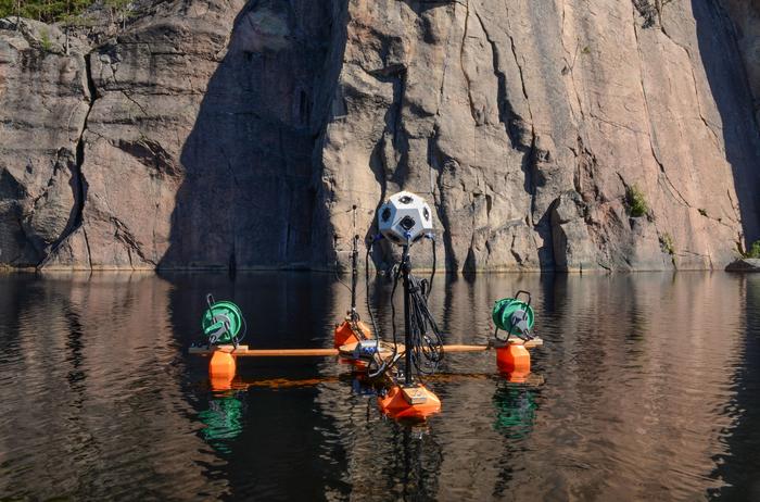 Figure 2. Custom-built raft used for summertime recordings. Photo by Julia Shpinitskaya. Photo Credits: Julia Shpinitskaya