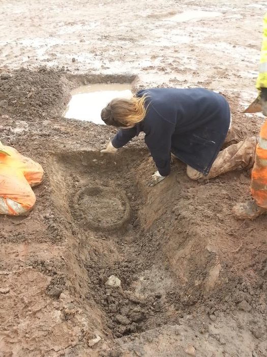A cauldron being uncovered at Glenfield. Photo Credits: University of Leicester
